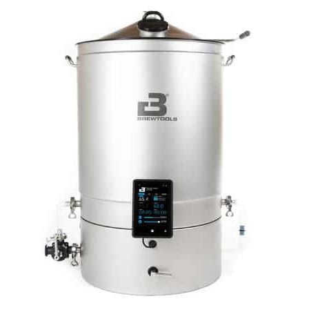 Electric stainless steel brewing kettle with a touchscreen control panel mounted on the front, handles on the sides, and a lid on top; used for homebrewing beer.