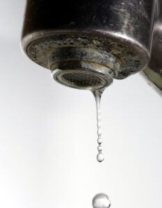 Hard_water_and_drop - The Malt Miller Dripping tap with limescale