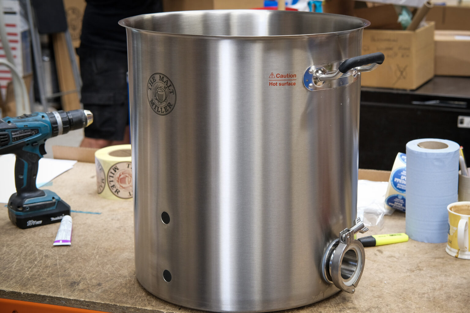 How to cut holes in stainless steel brewing vessels