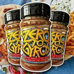 Tubby Toms Zero to Gyros – Ancient Greek Gyros Seasoning 170g Greek-style seasoning with herbs, garlic and warming spices. Tubby Toms Zero to Gyros delivers bold Mediterranean flavour for chicken, veg and classic gyros. Description What It Is / Who It’s For Tubby Toms Zero to Gyros is a punchy Greek-inspired seasoning built to bring herby, garlicky, sun-soaked flavour to your cooking. Designed for everything from classic chicken gyros to roasted veg and salads, it’s a proper all-rounder with serious flavour. If you want to turn everyday food into something that tastes like it came straight off a Greek street food grill — this is it. Key Features & Benefits Greek-style seasoning with herbs, garlic and spice Perfect for chicken gyros, halloumi and roasted veg Balanced herby, savoury and lightly spiced profile Works as a rub, marinade or finishing seasoning Vegan friendly Supplied in a 170g pack Flavour Profile Herby: Classic Mediterranean herbs Garlic: Strong, savoury backbone Spiced: Cumin, coriander and cinnamon warmth Fresh: Light citrus notes Balanced: Savoury with gentle heat A bold, aromatic seasoning that delivers depth and freshness in equal measure. How to Use As a Rub Oil your meat, coat evenly with seasoning and leave to marinade before grilling or roasting. For Gyros Marinate chicken in yoghurt for at least 24 hours, apply seasoning, then cook and slice thinly into warm pittas with salad and sauce. As a Seasoning Sprinkle over roasted vegetables, couscous, salads or halloumi for a quick flavour boost. Best For Chicken gyros and wraps Halloumi and grilled cheese Roasted vegetables Couscous and salads BBQ and tray bakes Ingredients Sea salt, herbs, paprika, smoked coriander, smoked cumin, garlic, onion, turmeric, pepper, lemon, cinnamon, Aleppo chilli. Allergen Advice: Contains mustard and celery.