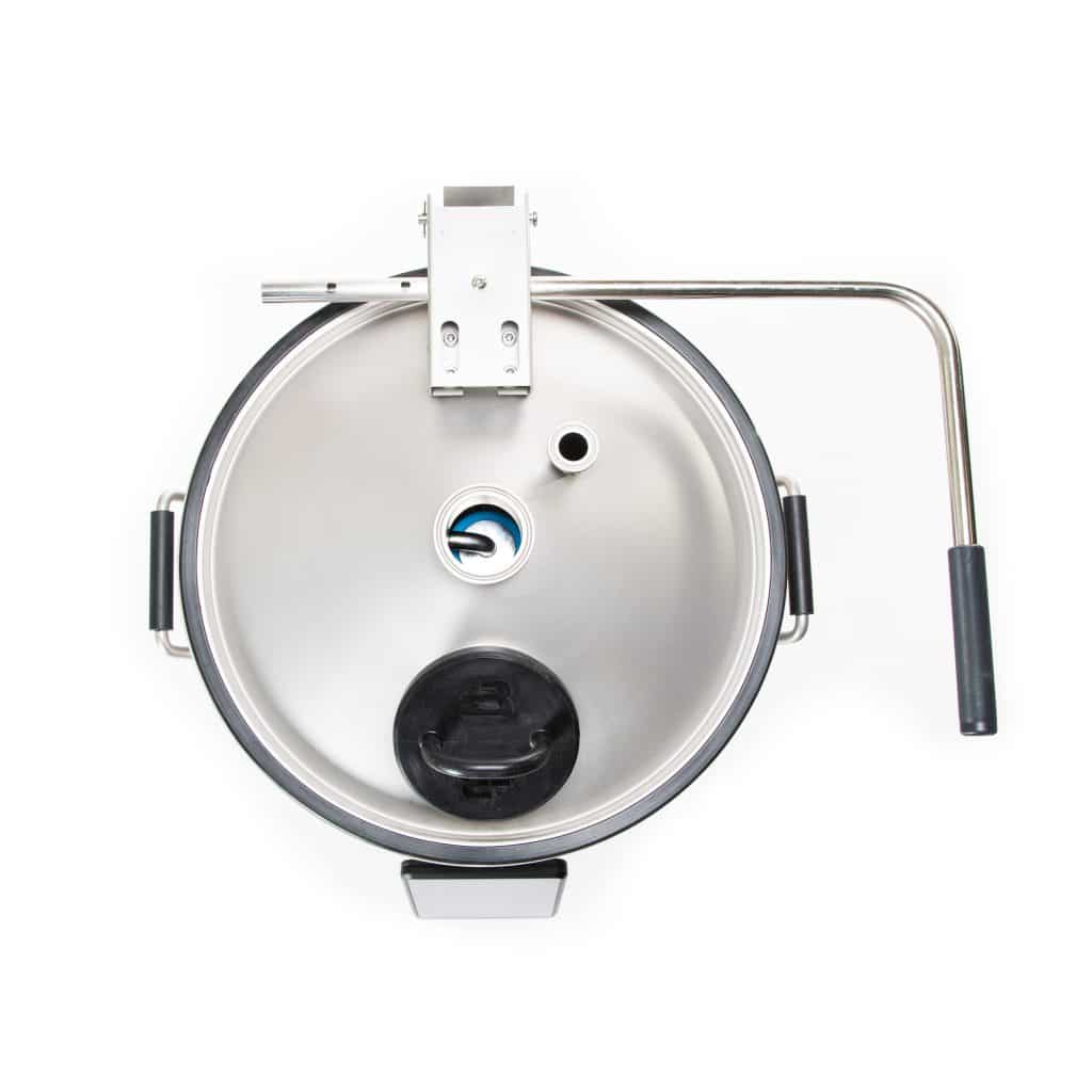 Industrial metal drum with central mounting bracket, clamps, and chrome handles seen from above.