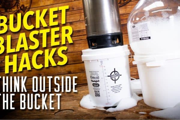 Thumbnail for 'Bucket Blaster Hacks' video: bold yellow text on a wooden wall with white buckets and foam, caption 'Think outside the bucket'.